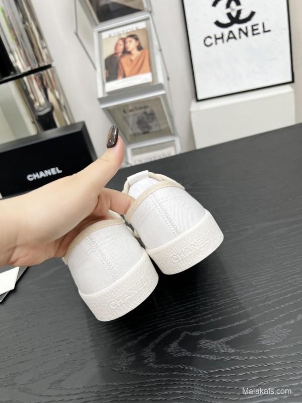 2025 Women Chanel White Canvas Casual Sneakers LY00230