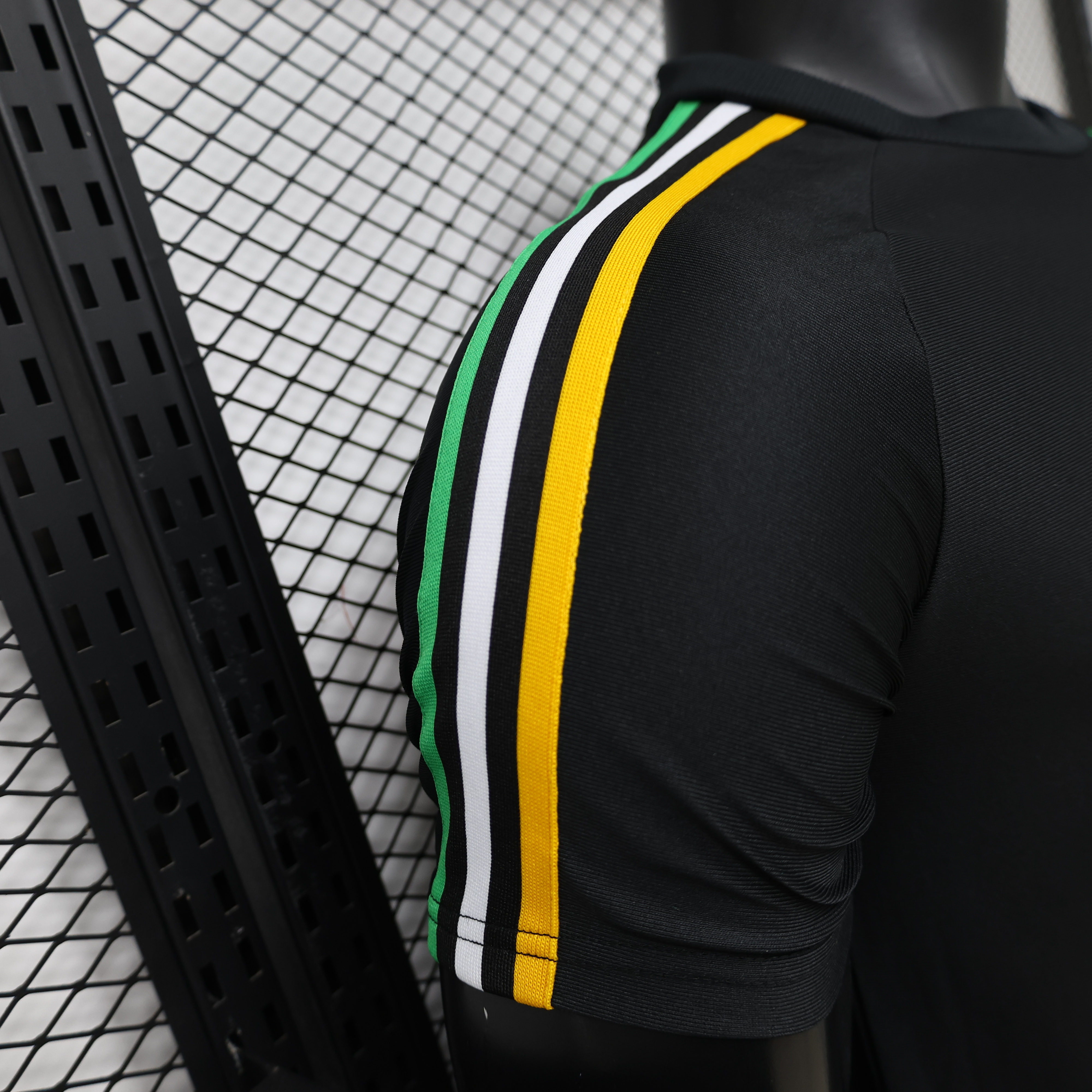 Player Version 26/27 Celtic Black with Asymmetric Yellow & Green Stripe Jersey